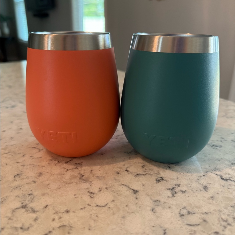 YETI Stainless Steel Tumblers in coral and Teal